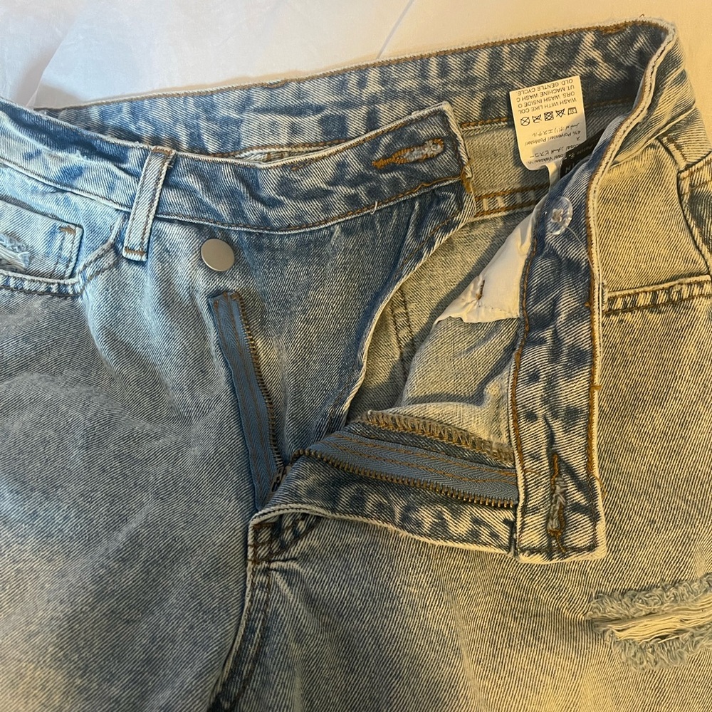 Distressed Blue Jeans - Picture 2 of 2